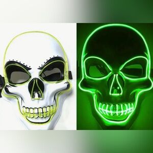 BRAND NEW HALLOWEEN SKELETON MASK . LIGHTS UP GREEN. KIDS AND ADULTS